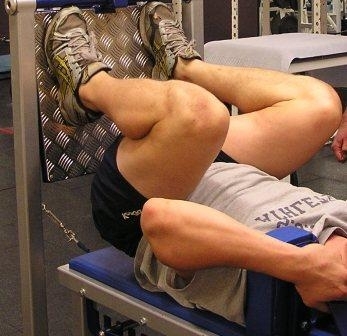 Tom Carter demonstrates the deep flexed position on the MyoThrusta hip and knee extensor strength developer